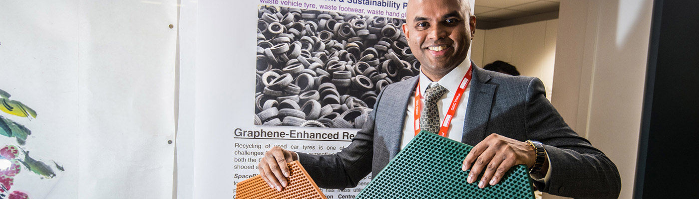 Vivek Koncherry demonstrating his graphene-enhanced Space Mats