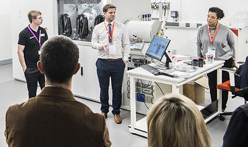 GEIC staff demonstrating facilities in the chemical vapour deposition lab