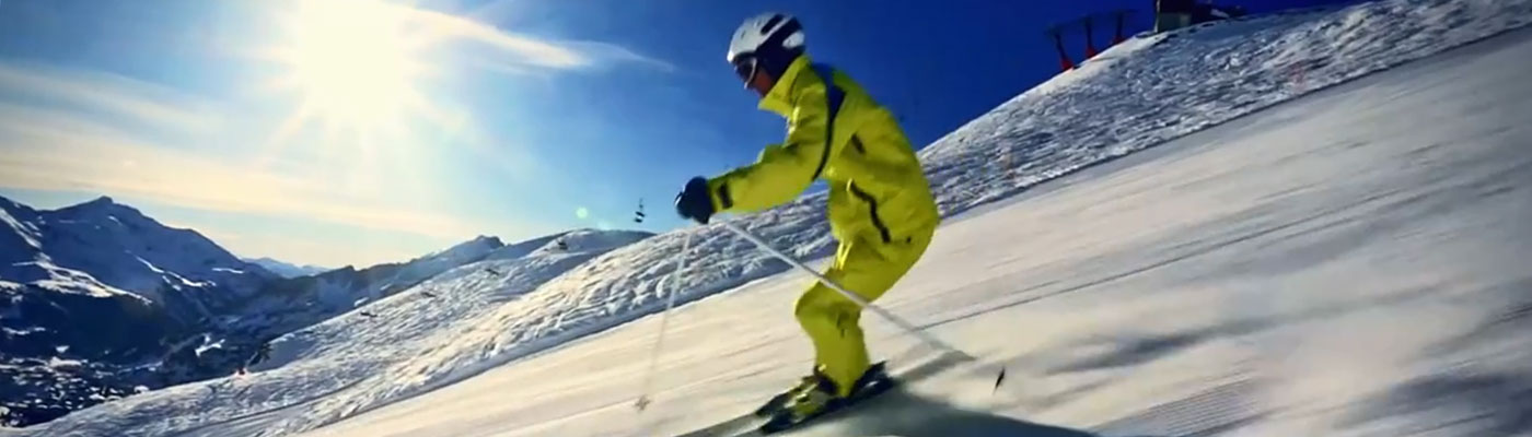 man skiing down a hill