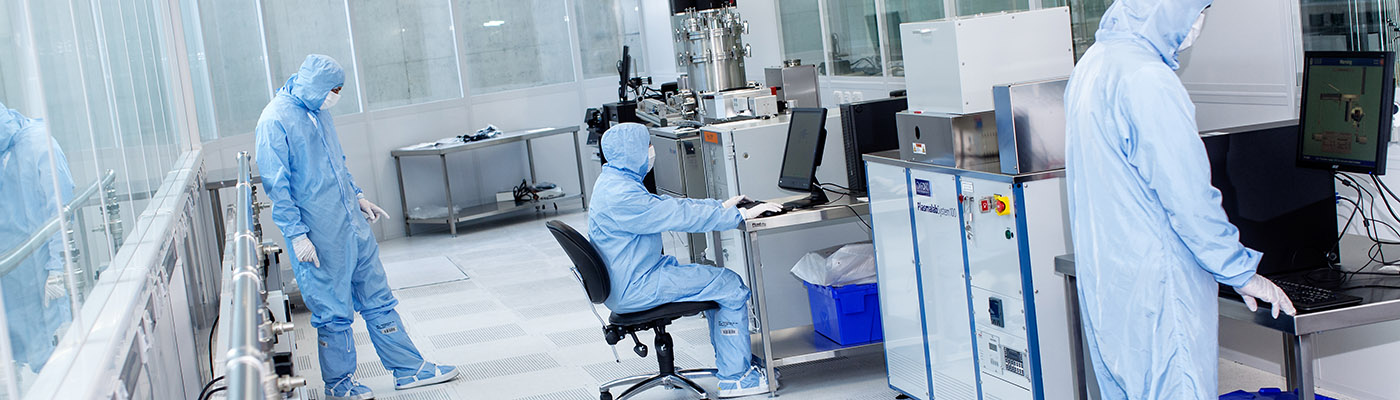 Researchers working in one of the cleanrooms at the National Graphene Institute